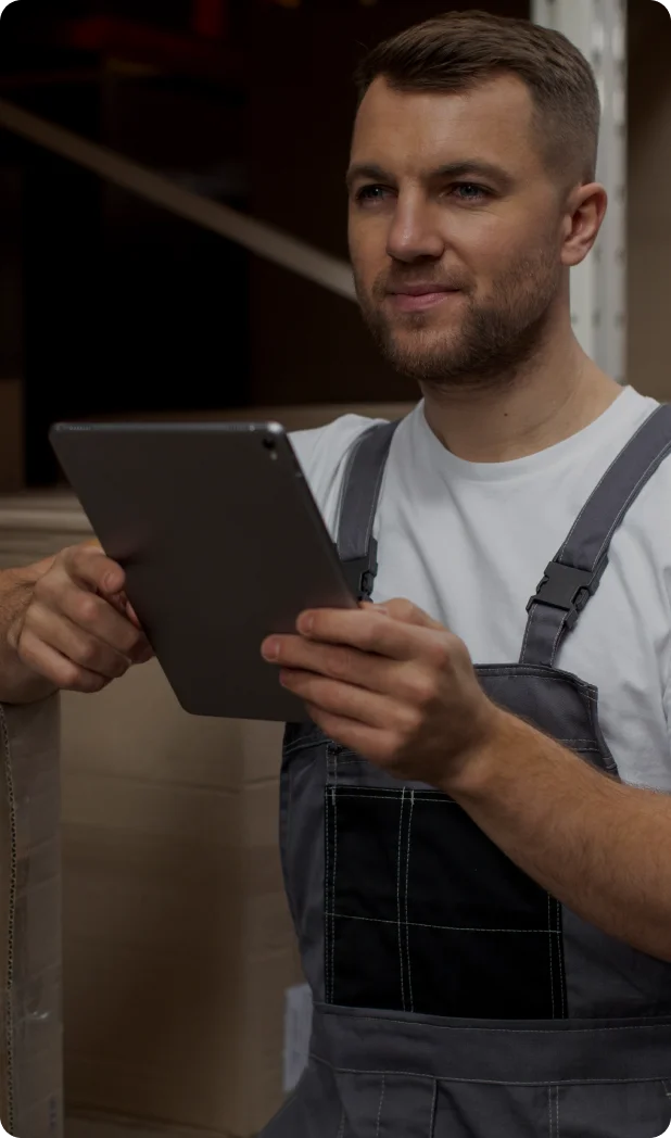 Supplier checking emissions data on a tablet